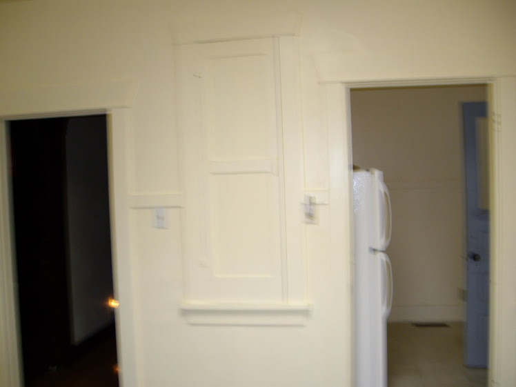 kitchen with cabinet with ironing board