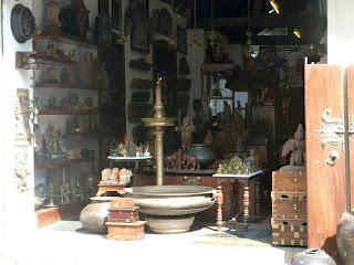 Antique shop selling brass and wooden antiques, Fort Kochi Jewish street antiwue shopping