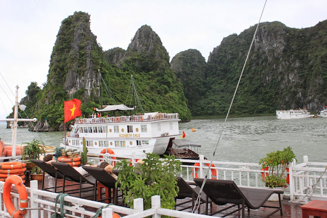 Looking over Halong Bay from top deck of Alova Cruise along Halong Bay in Hanoi, Vietnam Looking over Halong Bay from top deck of Alova Cruise along Halong Bay in Hanoi, Vietnam