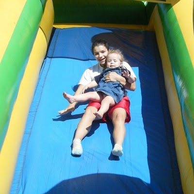 Sasha & Krystal on Inflatable Slide @ Buddy Walk 2011