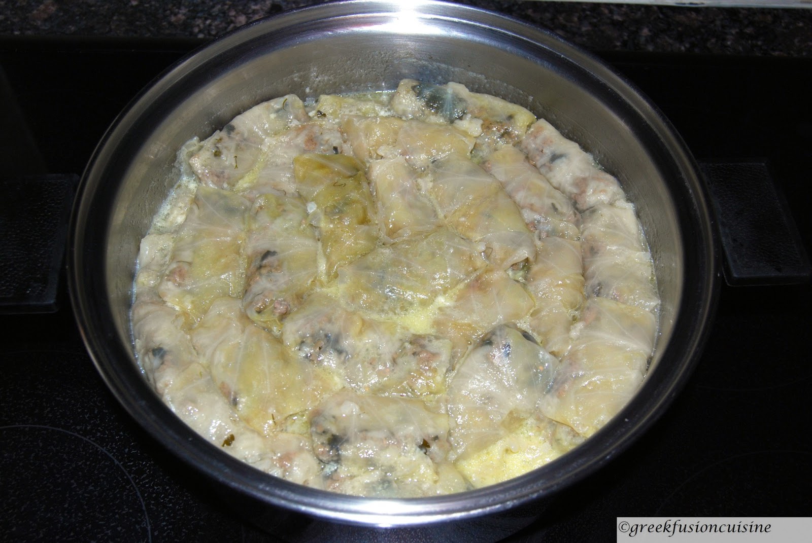 Greek Fusion Cuisine Cabbage rolls in Avgolemono (egg and lemon sauce)