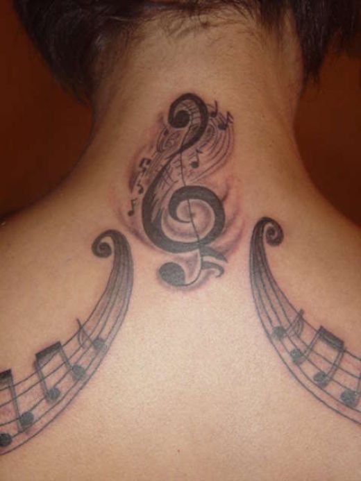 musical tattoo. tattoos of music notes.