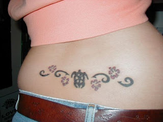 Hawaiian Flower Turtle Tattoo on Girls Lower back