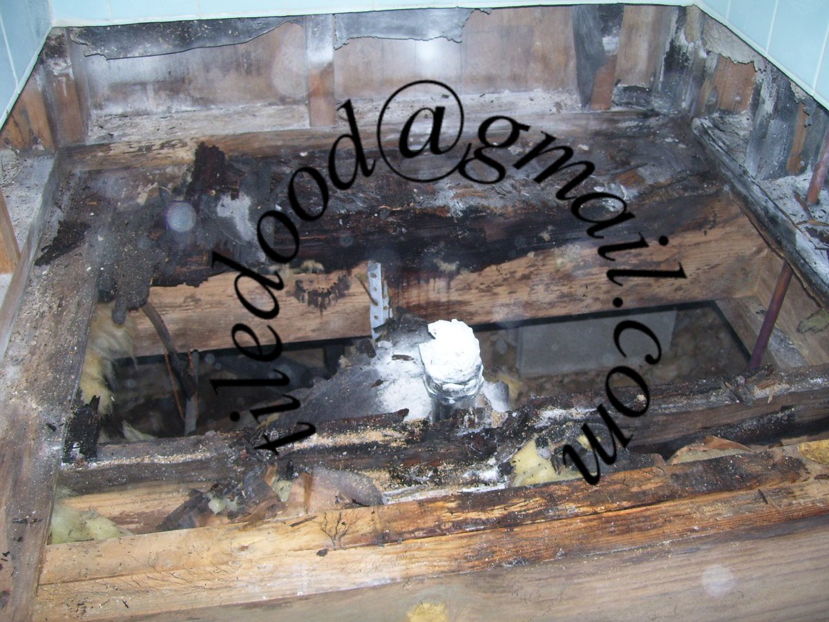 shower leaking tile pan water repair under subfloor cracked damaged acrylic rotten