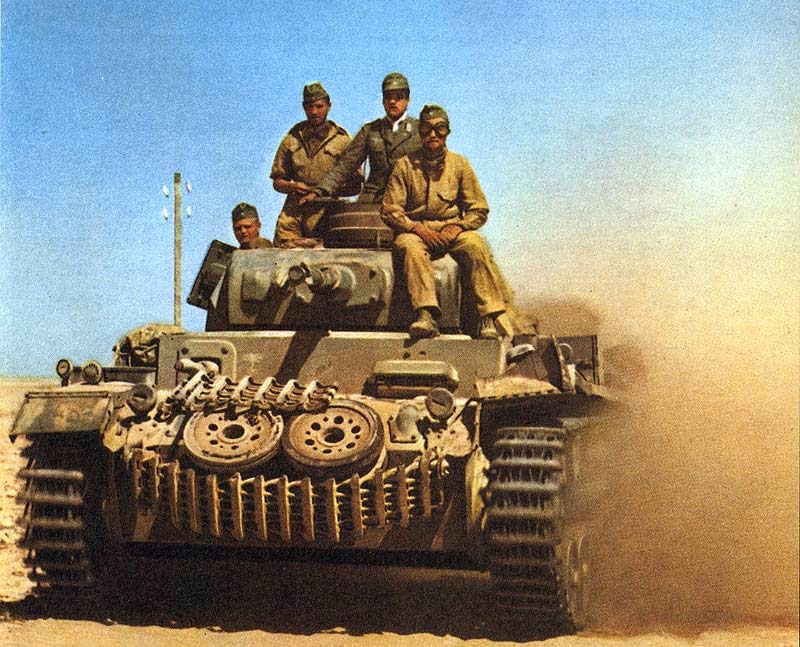 Panzer+III+of+Afrikakorps+advancing+at+s...Desert.jpg