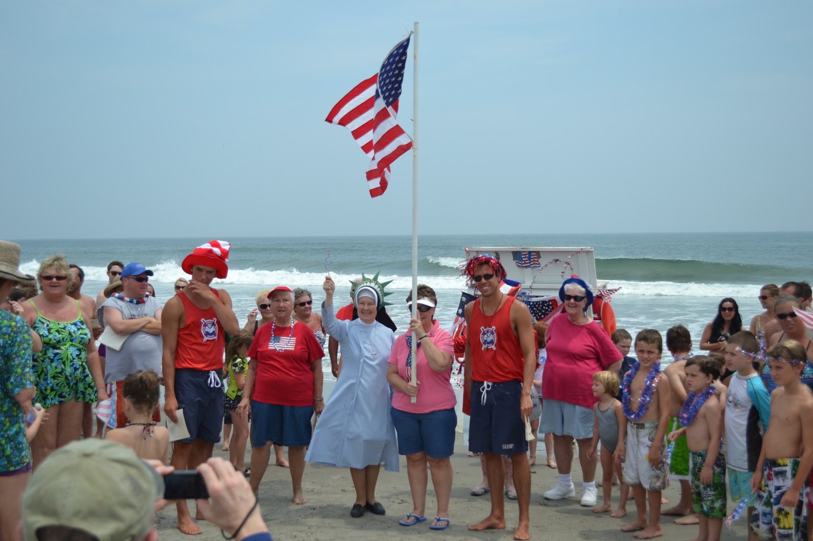 Singing Patriotic songs with the Nuns on the beach