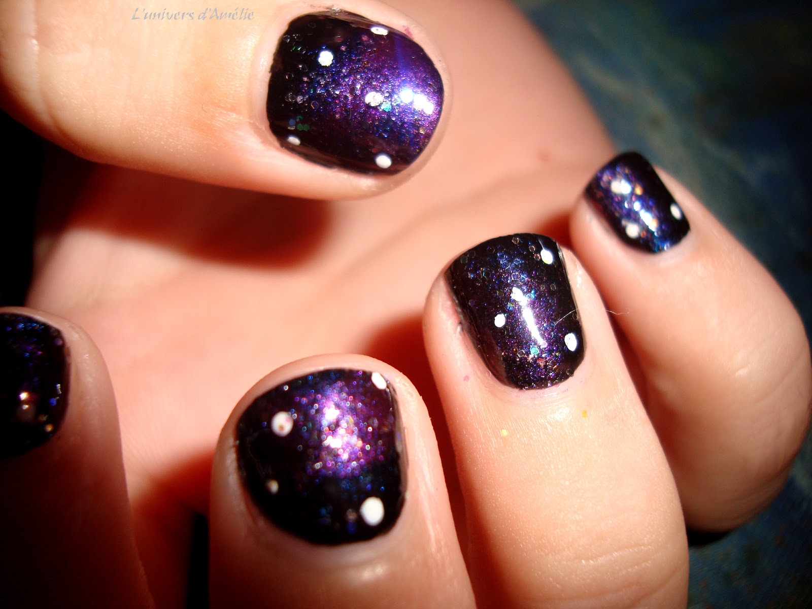 7. Black and Purple Galaxy Nail Art - wide 1