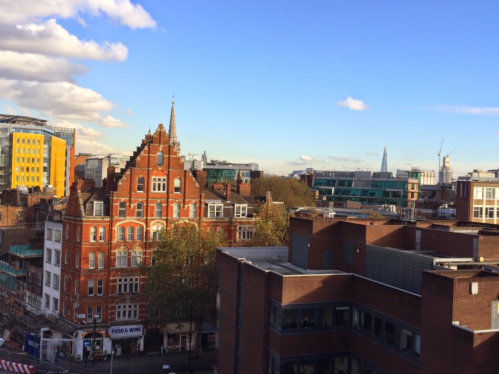 I tried really hard to zoom in the building that has fornasetti wallpaper