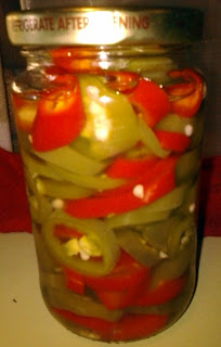 Pickled Peppers:  If Peter Piper picked a peck of pickled peppers, how many pickled peppers did Peter Piper pick?  I don't know, but I do know that this is a tasty and festive looking gift for any pepper lover.