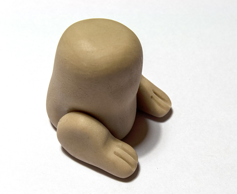 Dog fondant figurine back legs on body
