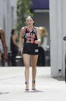 Miley Cyrus leggy wearing Chicago Bulls jersey