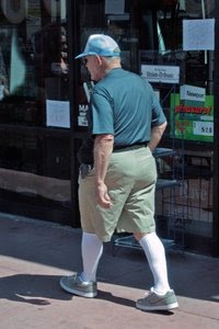 old man in sandals and socks