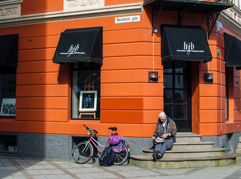 Old man reading outside a café Old man reading outside a café