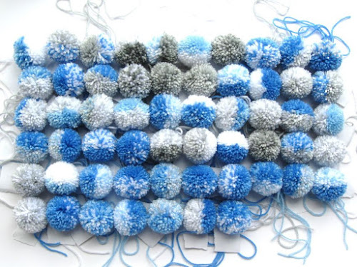 14 Homemade Blue Yarn Pom Poms