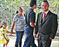 The groom awaiting his soon-to-be bride groom waiting a bit awkwardly for the bride