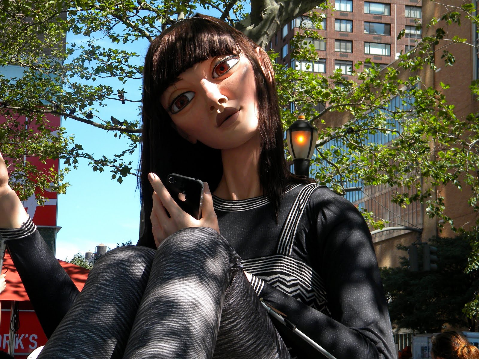 Marina, the 25-foot tall Missoni-clad doll who likes to blogger and tweet