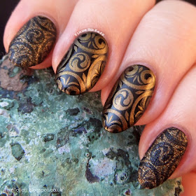 Black gold stamped nail art