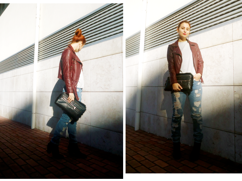 fashion blogger with casual and chic look, with ripped jeans and leather jacket