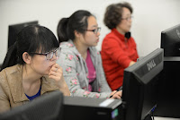 photo of students using a computer