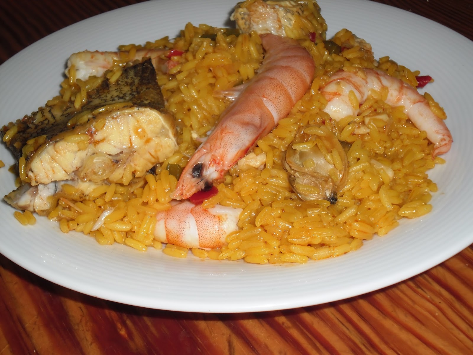 El que come bien vive mejor PAELLA DE MERO CON LANGOSTINOS