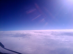 Airplane Window View of Clouds