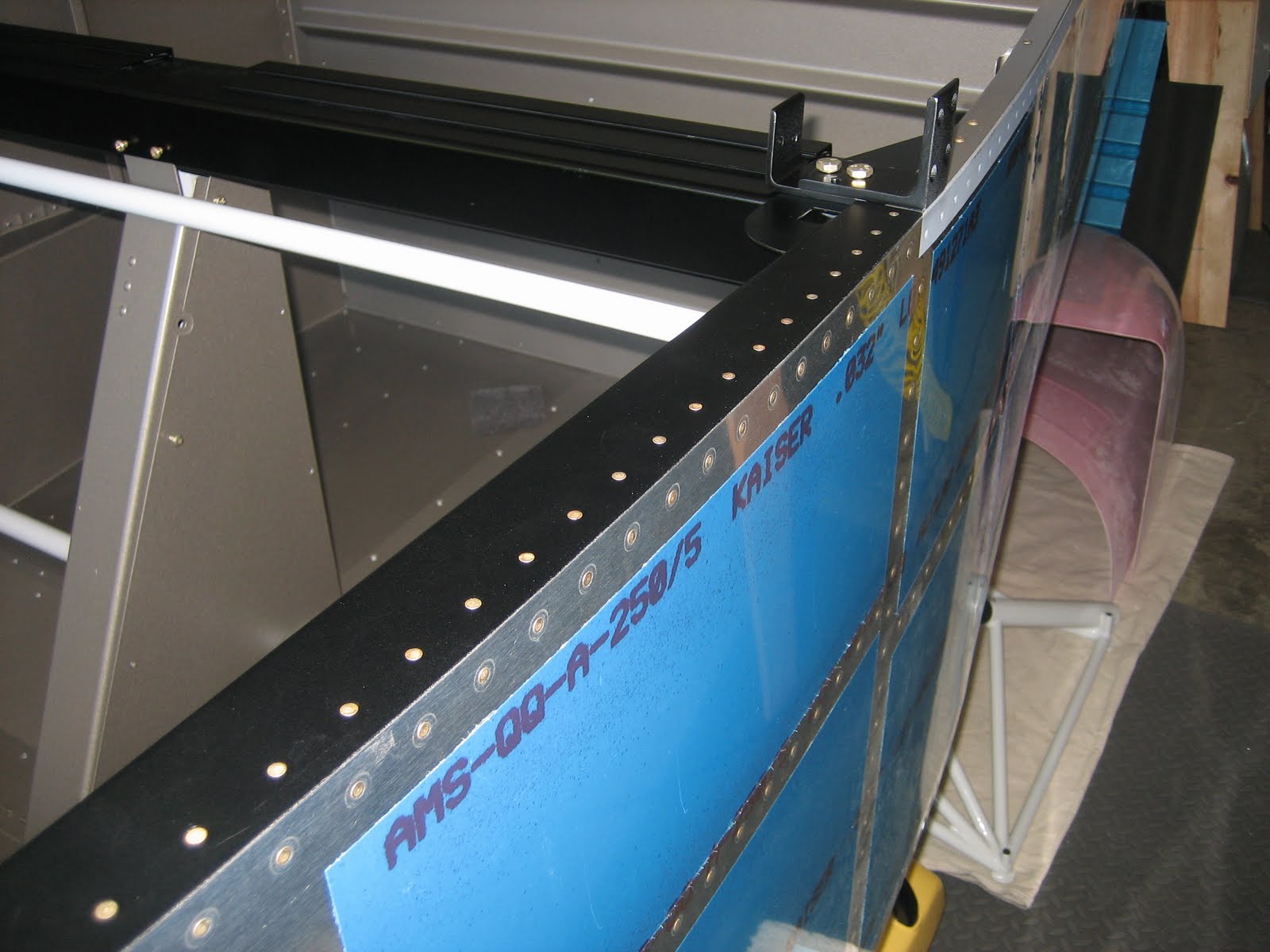 Chad and Bekah's RV7 Canopy Side Rail riveting