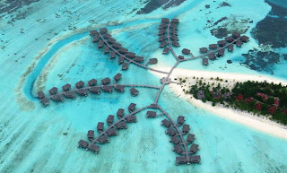 نقره لتكبير أو تصغير الصورة ونقرتين لعرض الصورة في صفحة مستقلة بحجمها الطبيعي