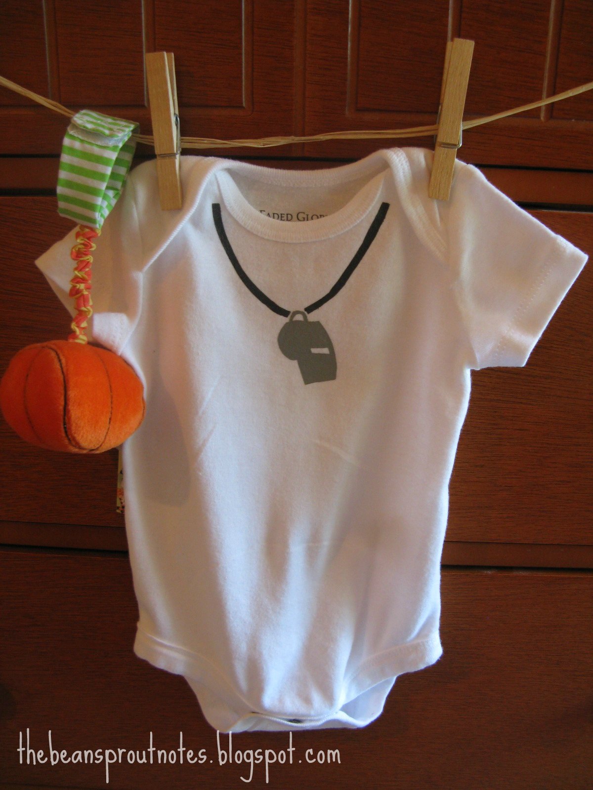 The Bean Sprout Notes Assistant Coach Baby Onesie