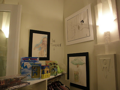 art by Ian Tomasino and merchandise for sale at The Alternative Cafe