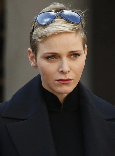 Prince Albert II of Monaco and Princess Charlene of Monaco, Princess Caroline of Hanover and Princess Alexandra observe a minute of silence on November 16, 2015 at the Monaco Palace in Monaco 