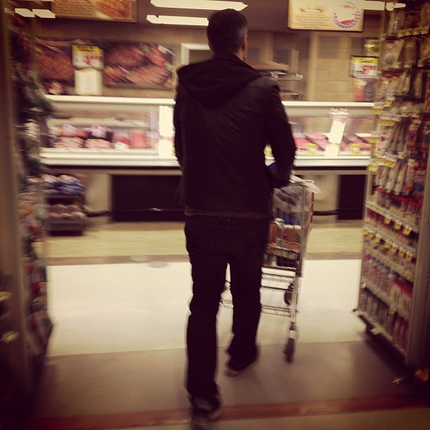 husband shopping at the market
