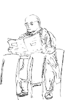 Man reading at Starbucks