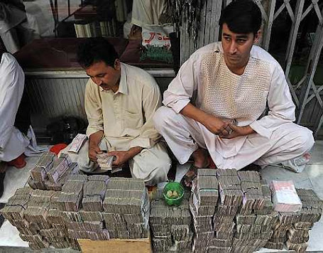 Afghani money changers