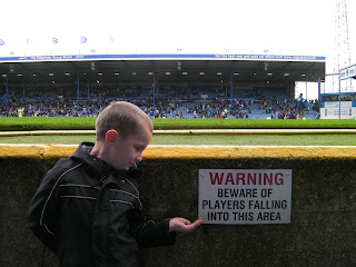 funny sign at football club ground