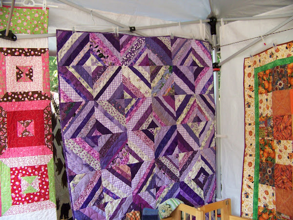 Handmade quilts by the local quilting guild