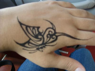 I even have a tattoo on my hand like her This is what it looks like