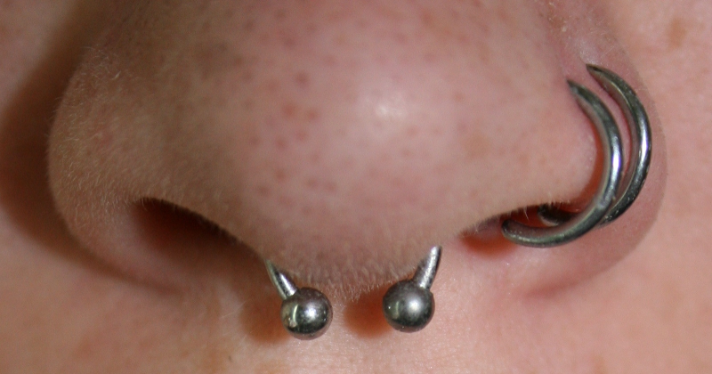 have three piercings in my nose - the left side pierced twice and my title=