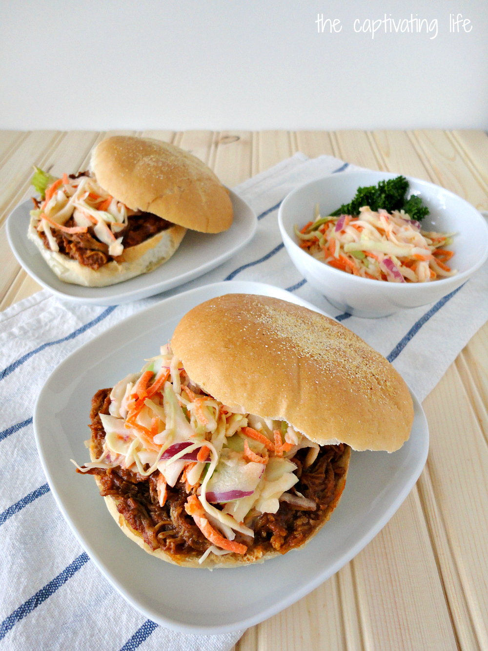 The Captivating Life Slow Cooker Pulled Pork Sandwiches with Coleslaw