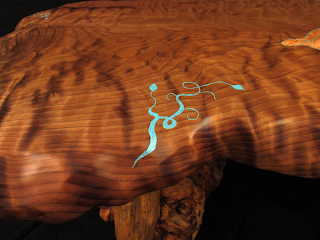 turquoise inlaid in wood