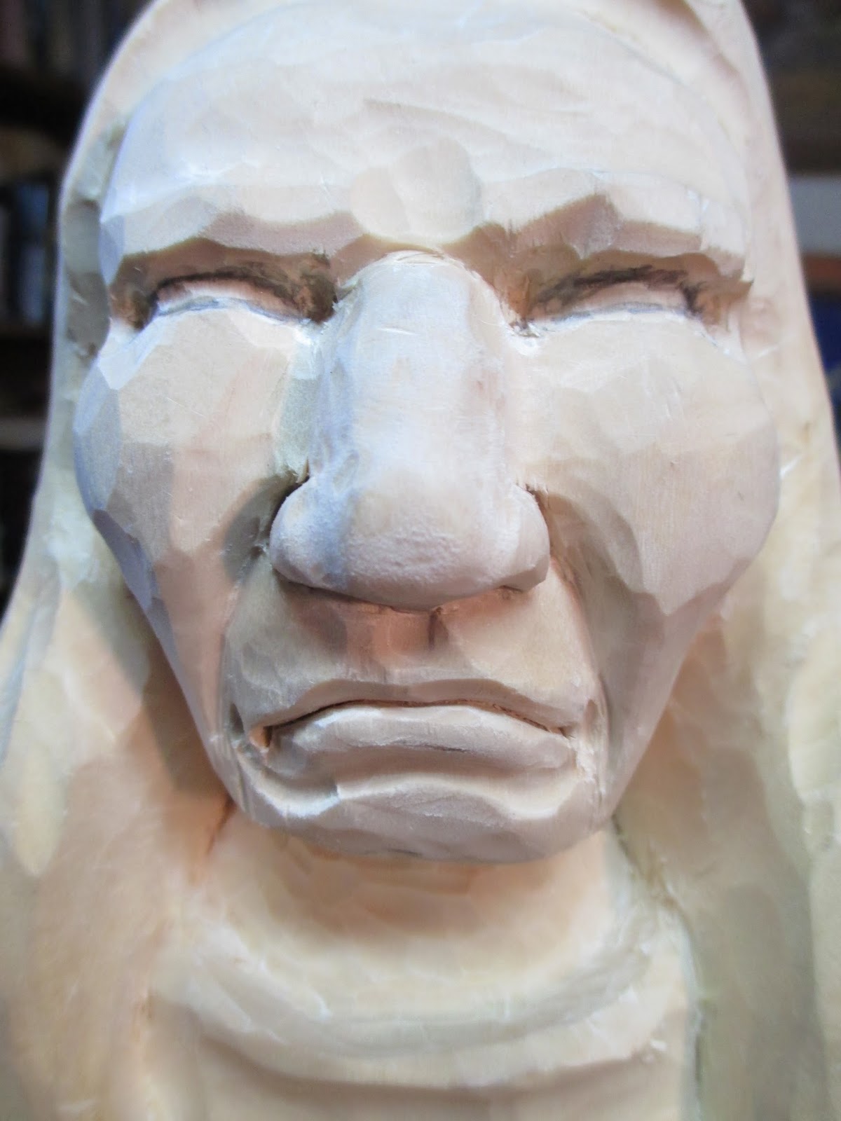 Knotty Wood Spirits Carving an Eye