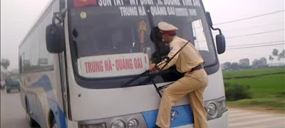 Fleeing Bus Driver Takes Vietnam Cop On Wild Ride