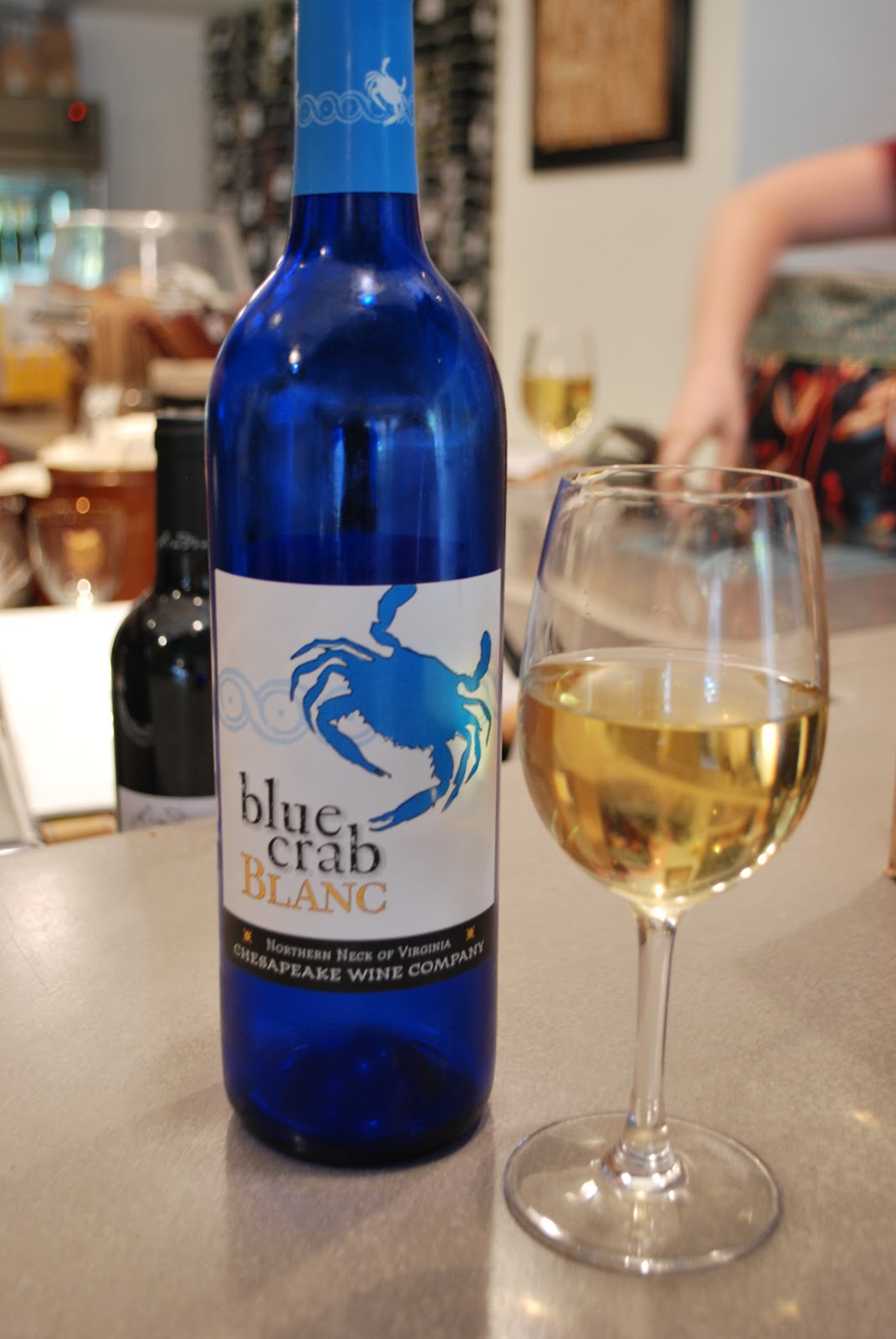 High Heeled Traveler Exploring Wine Blue Crab Blanc
