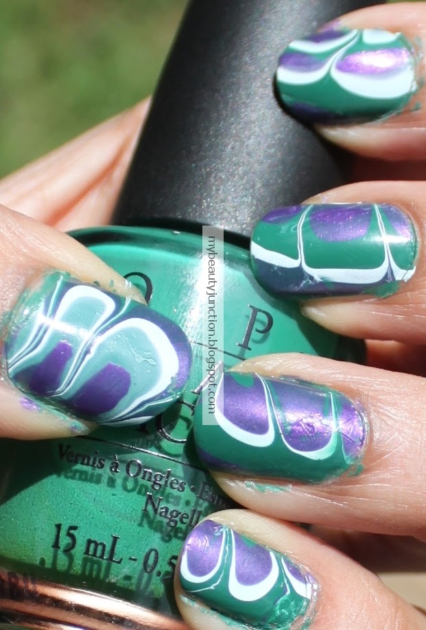 Water marbling nail art with O.P.I. polishes and tips and pointers