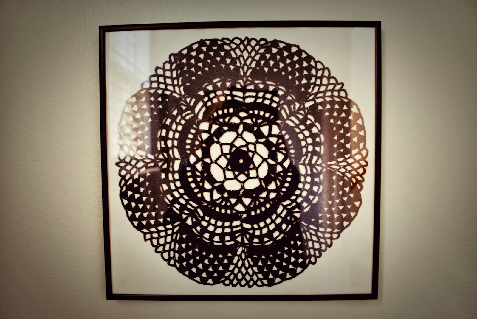 Framed crochet doilies wall art