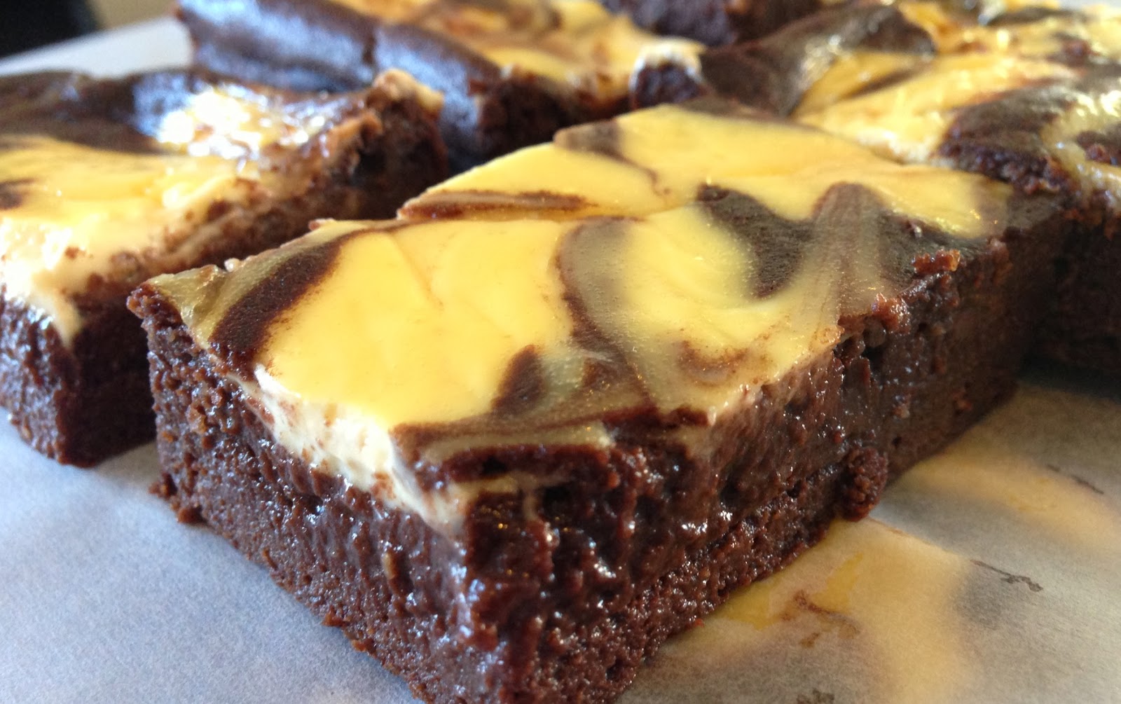 Grabbing life by the kettlebells... Cheesecake Brownies...