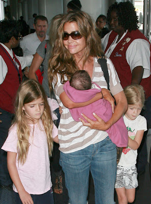 Denise Richards and with Her daughters Sam and Lola photos Arriving At LAX Airport