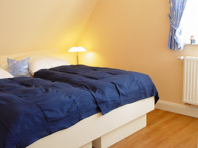 Reetdach-Ferienhaus "Mare Frisicum" St. Peter-Ording, Wohnbeispiel Schlafzimmer Reetdach-Ferienhaus "Mare Frisicum" St. Peter-Ording, Wohnbeispiel Schlafzimmer