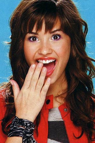 demi lovato. Growing up, Demi Lovato won several talent contests and performed in famous 