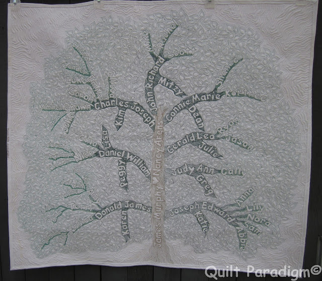 http://quiltparadigm.blogspot.com/2015/08/family-tree-quilt-finished-for-reals.html