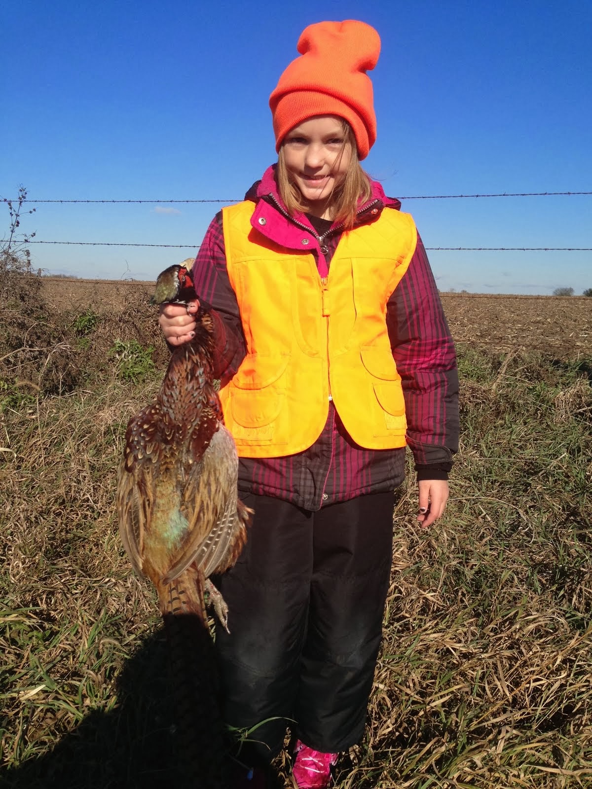 Boo's first rooster!